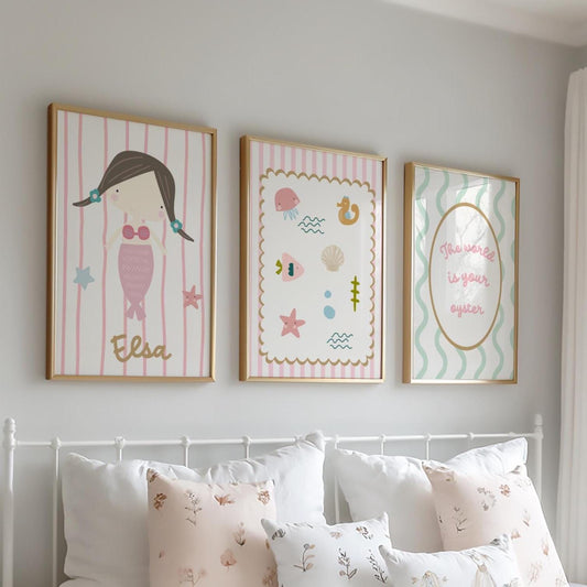 Set of 3 mermaid wall prints for a girl’s nursery or bedroom, including a personalised name print and ocean themed illustrations